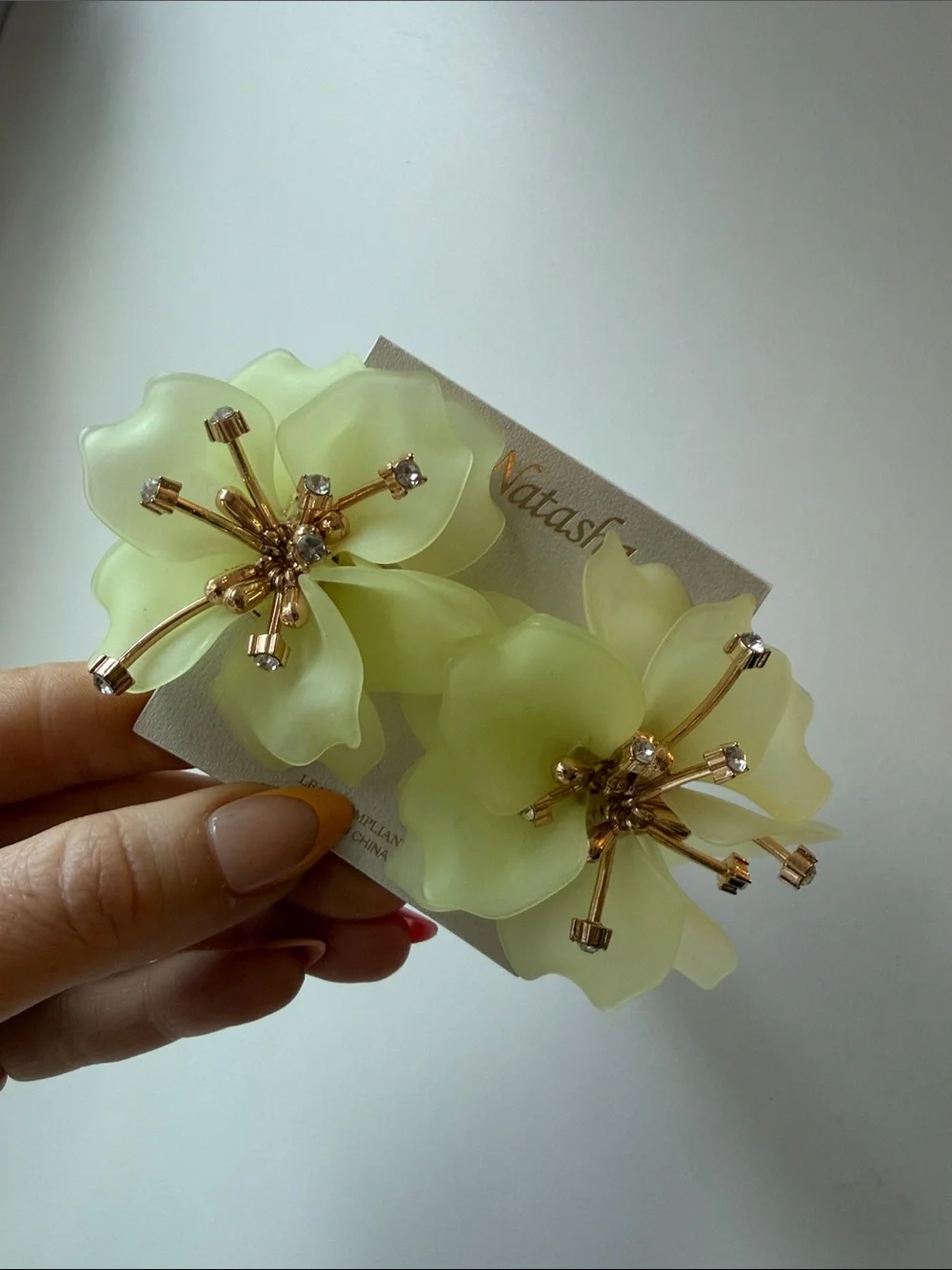Natasha Couture light green statement earrings with Gold Accents